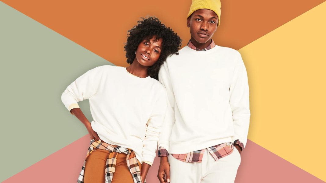 A woman leaning on the shoulder of a man modeling Old Navy Black Friday Fall Sale Men's Women's Clothing