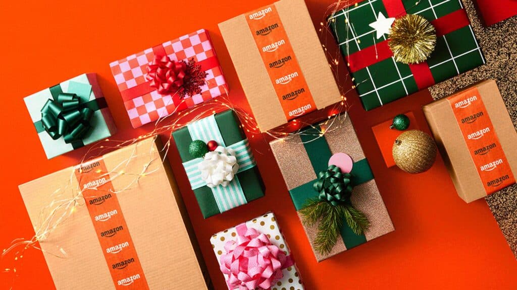 amazon christmas packages on orange background