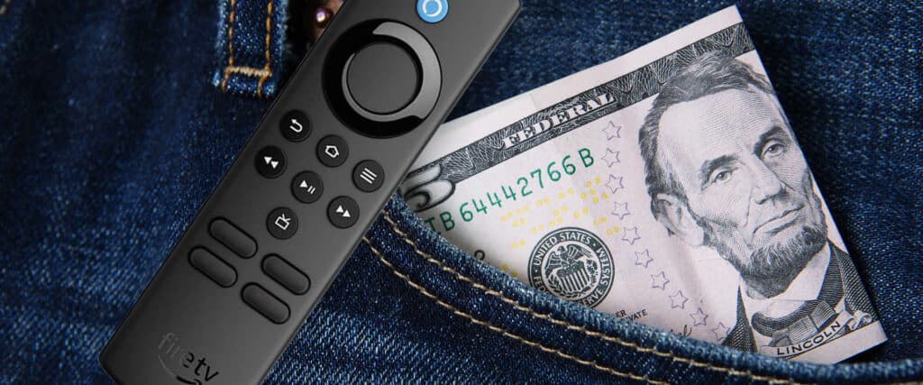 5 dollar bill in pocket with fire tv remote